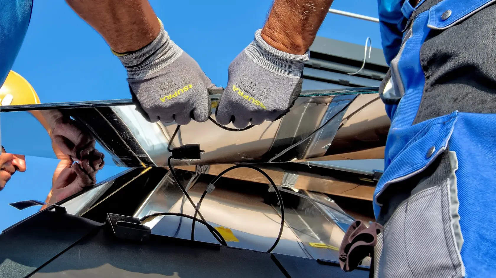 WS Powergrid technician installing a solar panel