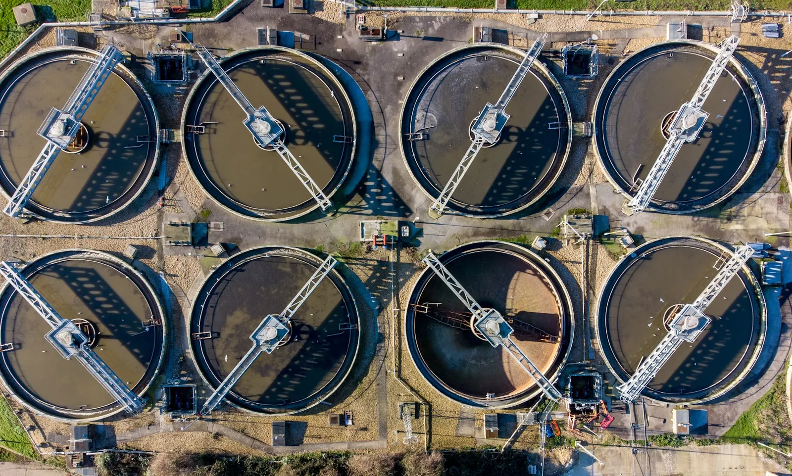 Water treatment infrastructure with processing basins